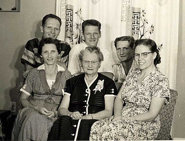 Reunion shortly after WW2. Front row from left, Thelma Louise  (Cissy) Miles Bacon, center, the mother, widow of Ray Francis Miles, Kitty Pearl (Craw) Miles, Keele -Margaret Lee(Meg) Miles, Austin, back row from left, Eugene Leroy (E.L.)Miles--Lynn Bernar