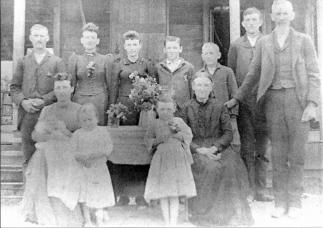Wilbur Fisk Family:  Standing (Left to Right) George W. Hawkins, Lucy Miles, Mucia Ida Miles,  Mertie Sherman Miles, Olin Terice Miles, John Franklin Miles, Wilbur Fisk Miles, Seated: Belle Miles & Hamilton, Wilma, Mae, Levina Angelina Moore Miles