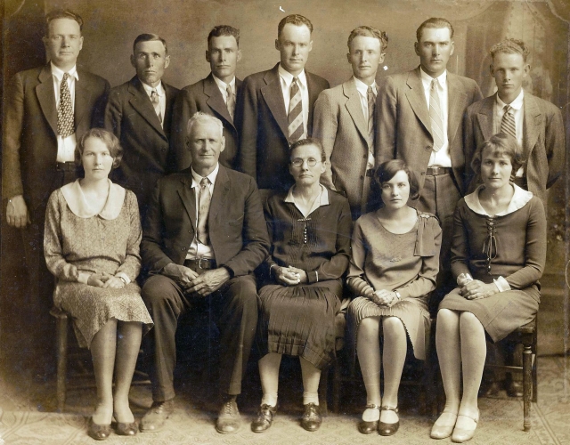 William W. Miles Family
Back Row:  Kelly, Clarence, Luther, Tolley, Thomas, Clement, Raymond  Front Row: Anna Lou, Will Miles, Laura Miles, Nora Lee, Addene  Photor circa 1925
